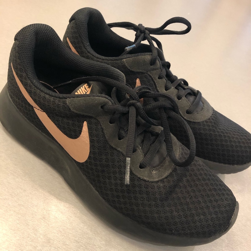 Black Nikes with Rose Gold logo